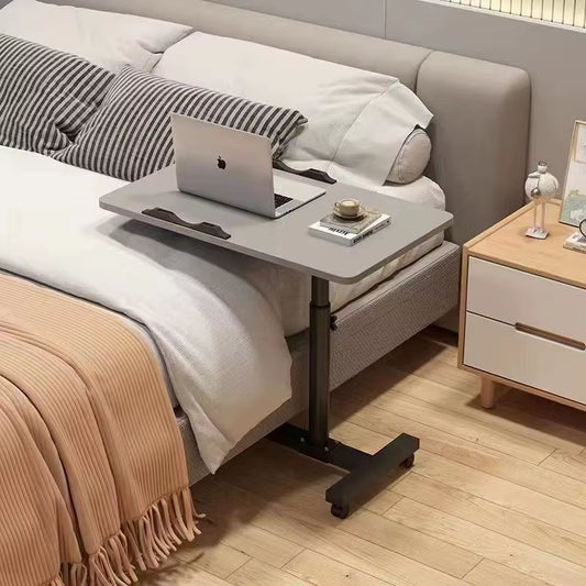 The Laptop Desk Rotates and Moves the Small Bedside Table